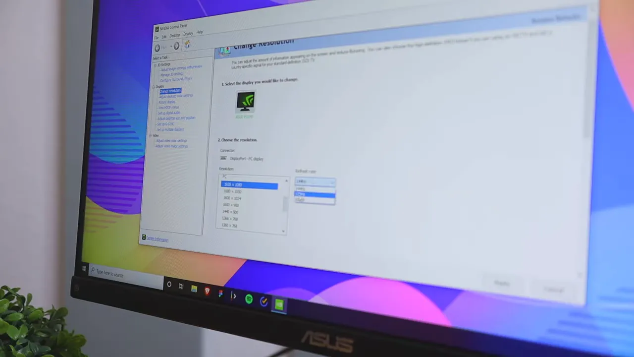 Monitor showing NVIDIA 'Change Resolution' dialog with the refresh rate dropdown set to 144Hz