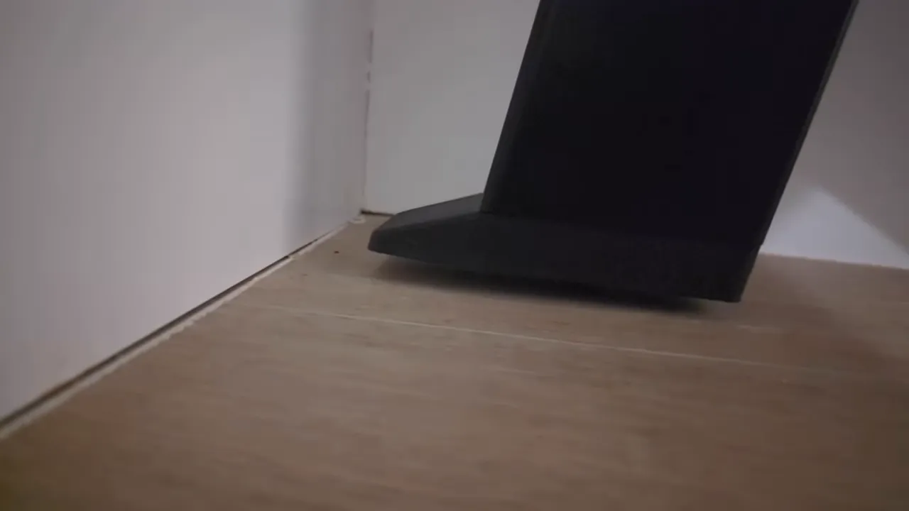 Close-up of caster under desk with caster deployed