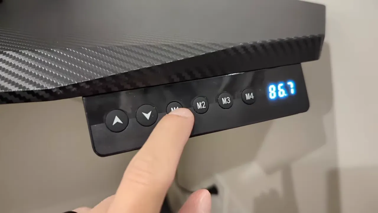Carbon textured desktop with ergonomic arc view