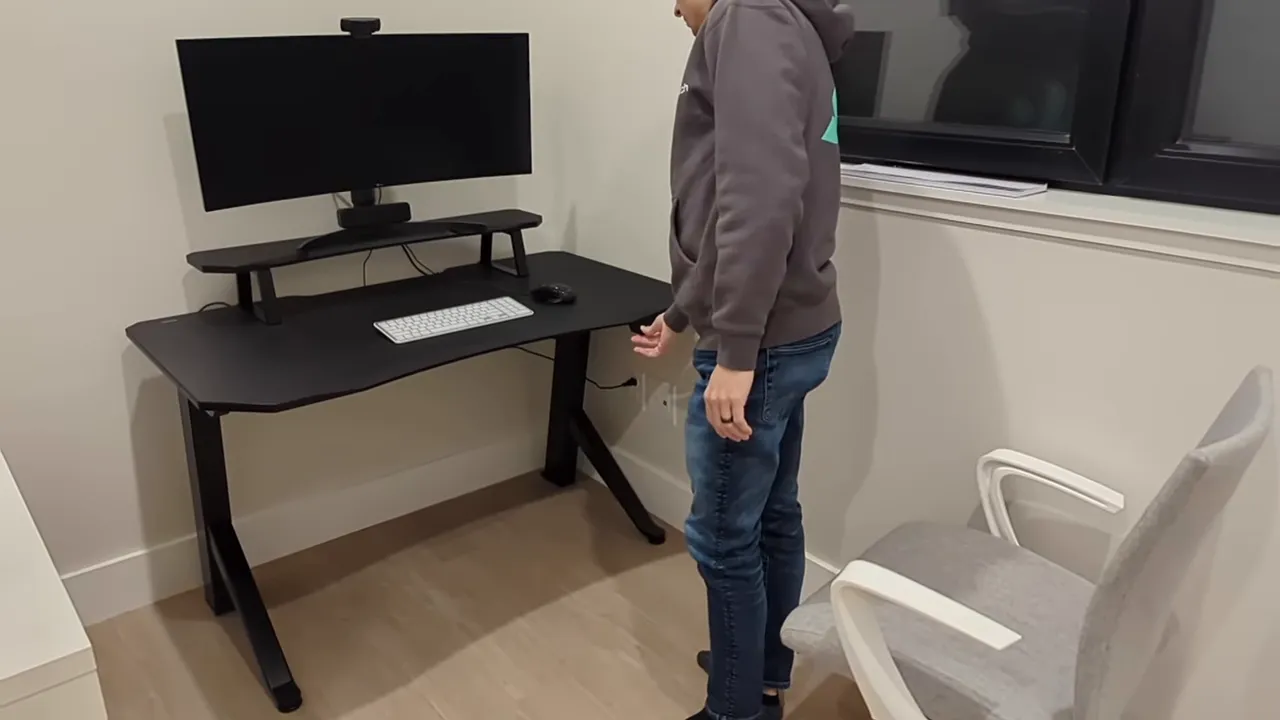 Standing desk mid-transition raising height