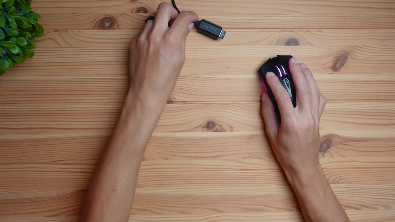 USB receiver plugged into the dock area with the cable ready to connect