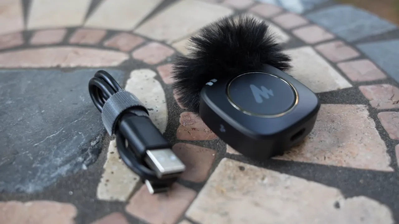 WM820 transmitter with USB-C charging cable and windscreen