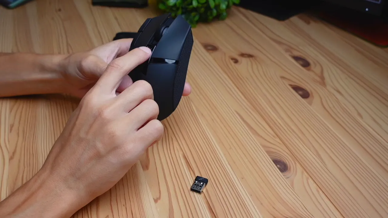 Side view showing the multi-button cluster with many programmable buttons