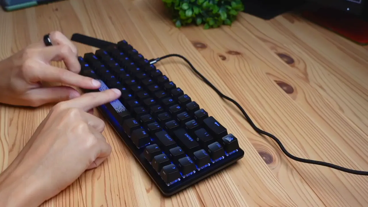 Triangular pattern space bar illuminated in blue