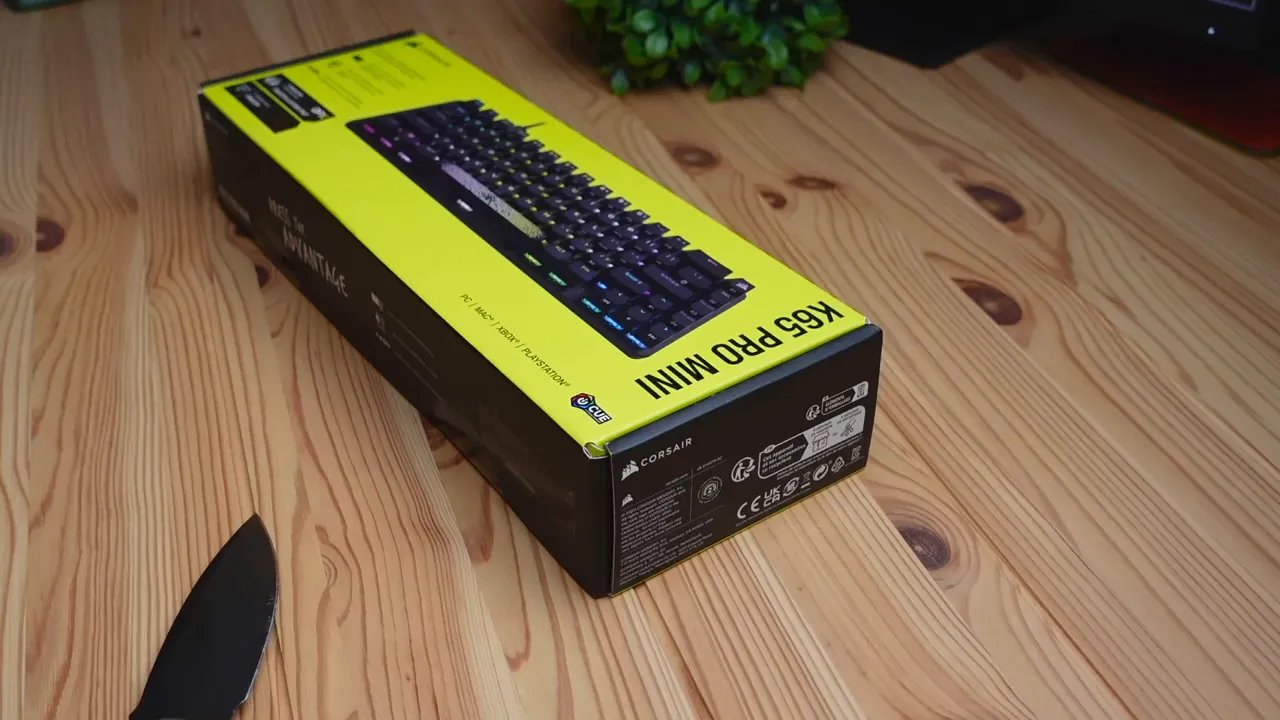 Corsair K65 Pro Mini box with yellow and black design