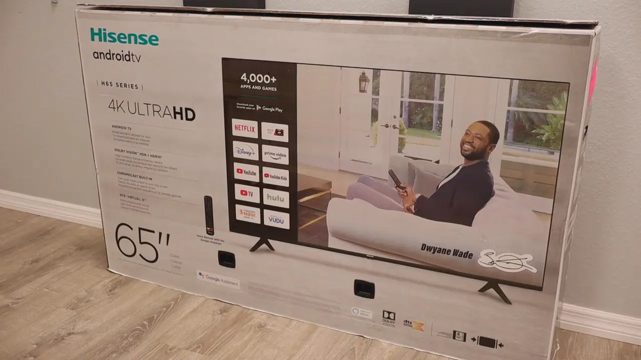 Hisense 65 inch Android TV retail box standing upright on a floor