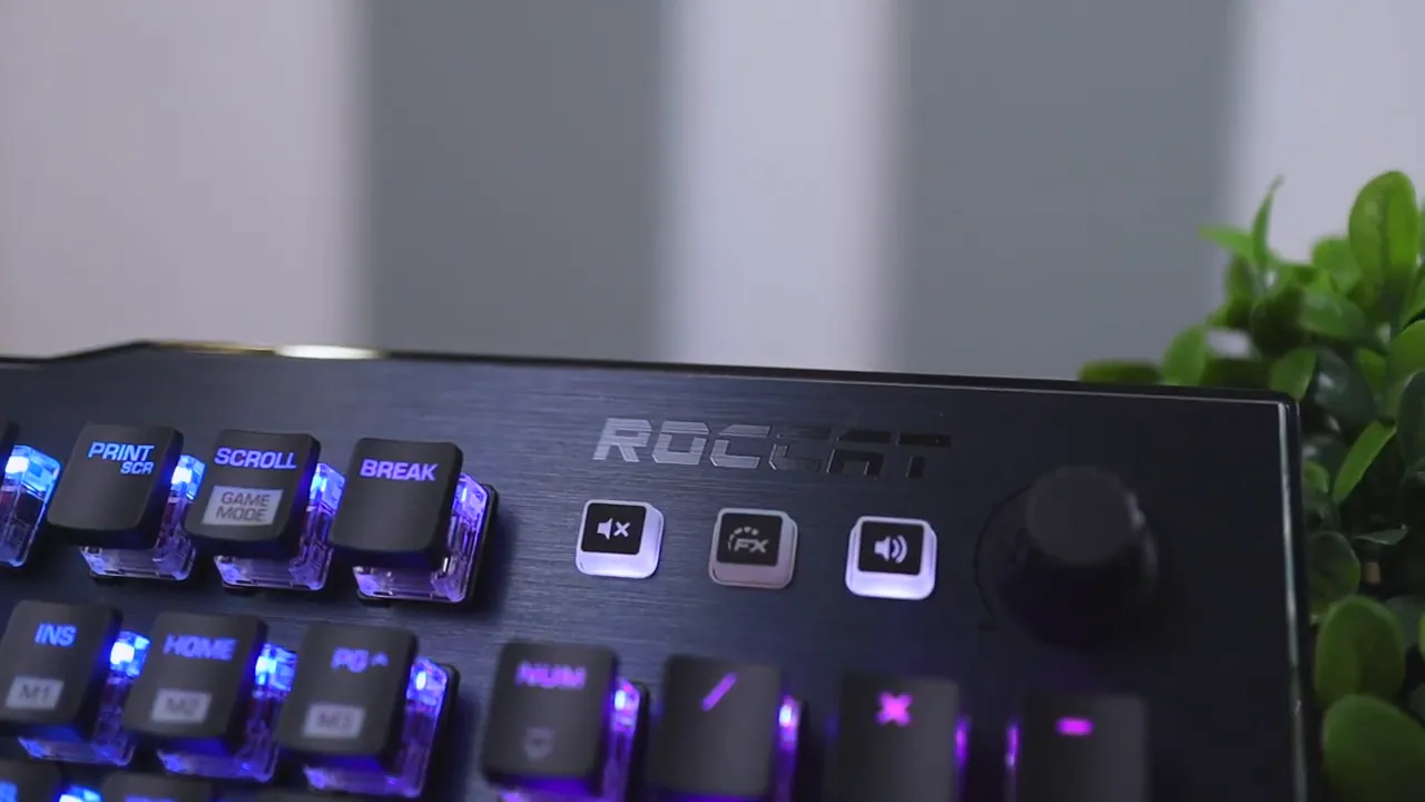 Top right corner of the keyboard showing Roccat logo media buttons and volume wheel