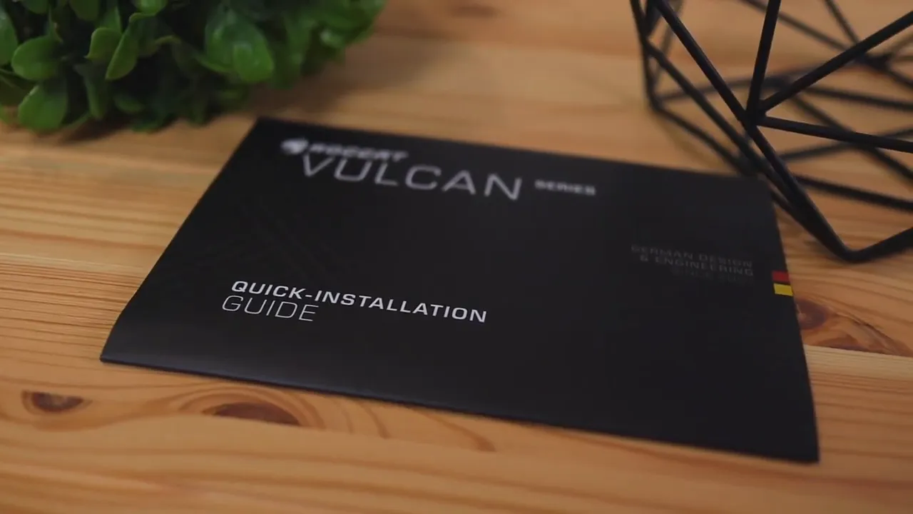 Black quick installation guide labeled Vulcan 121 AIMO on a wood desk