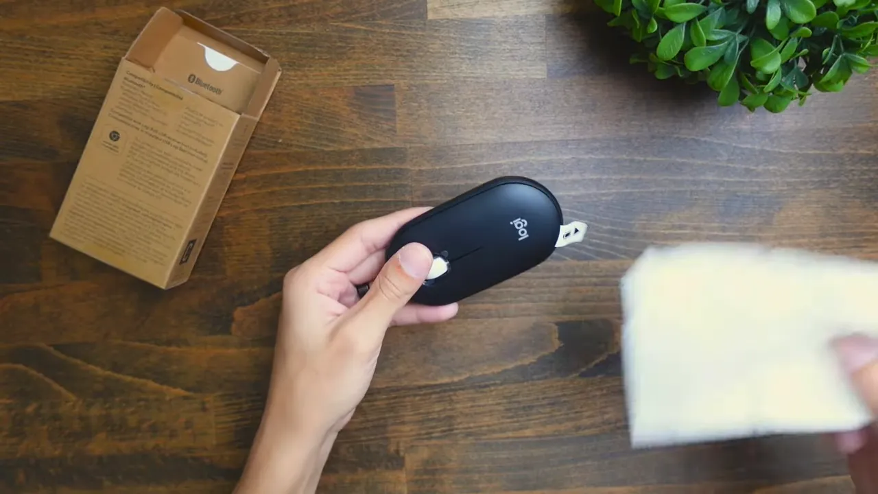 Logitech Pebble Mouse 2 lifted out of the packaging