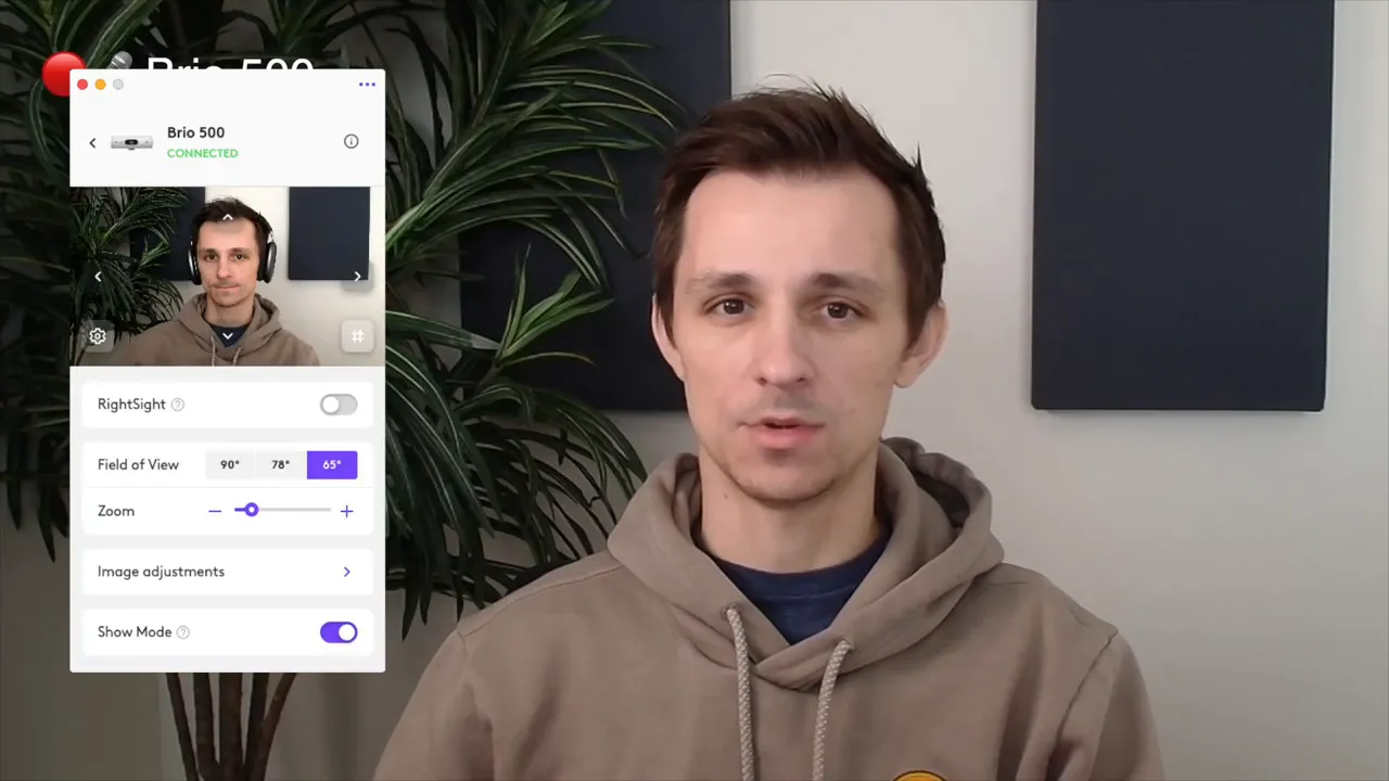 Close view of presenter with Logi Tune field-of-view controls overlay on the left showing 90°, 78°, 65° and a zoom slider