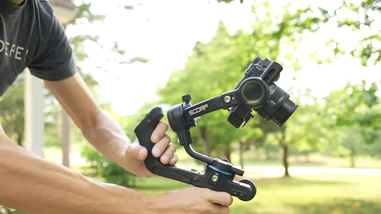 SCORP-C held with two hands showing the front trigger position and overall grip