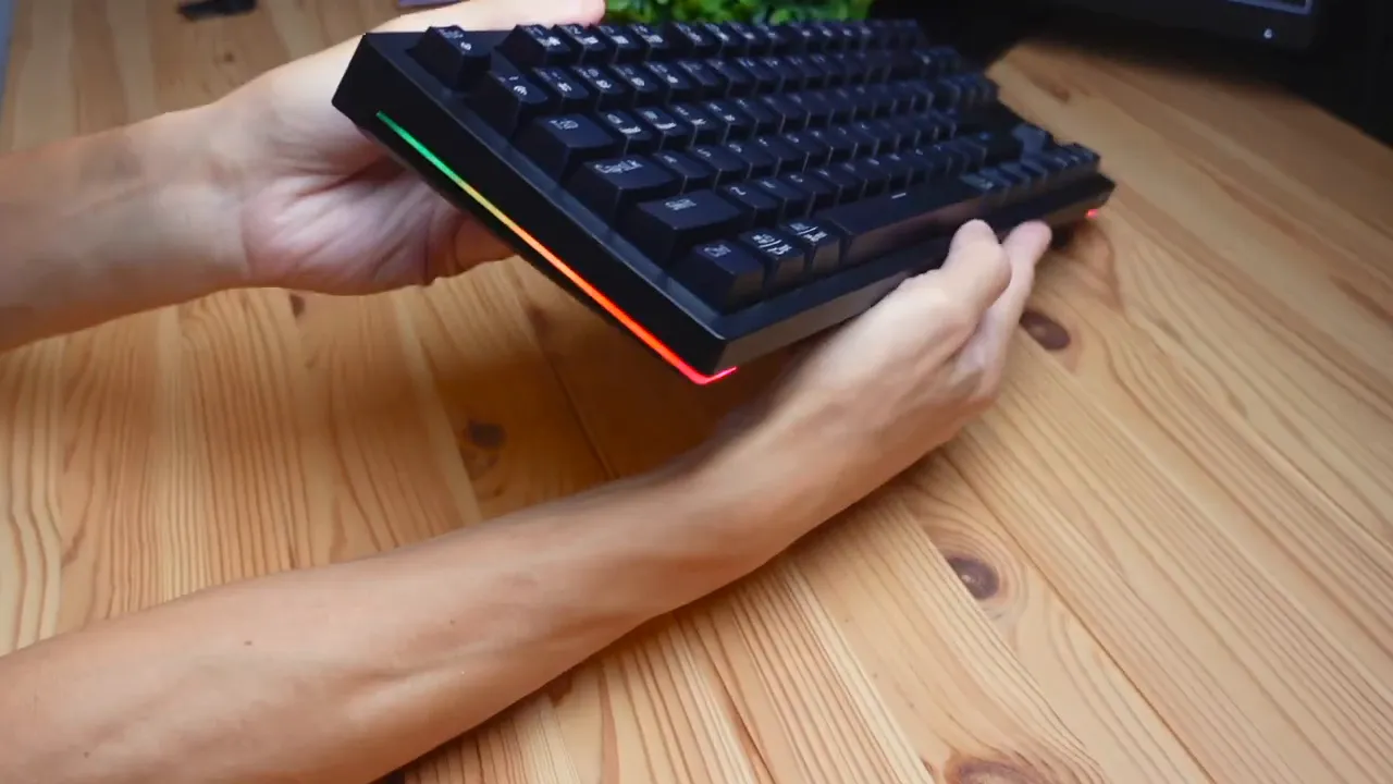 Keyboard illuminated showing side RGB lighting and under-key RGB glow