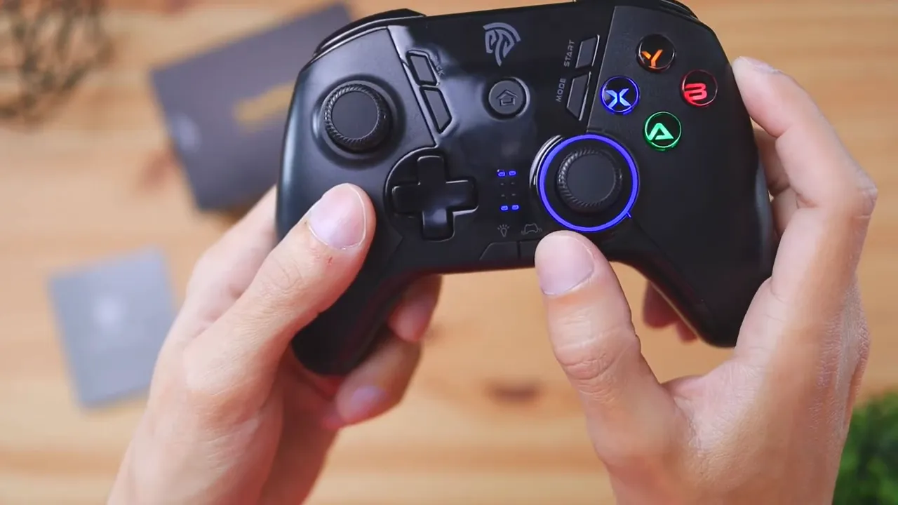 High-quality close-up of EasySMX ESM 9110 showing illuminated LED ring, colored face buttons and center indicator lights