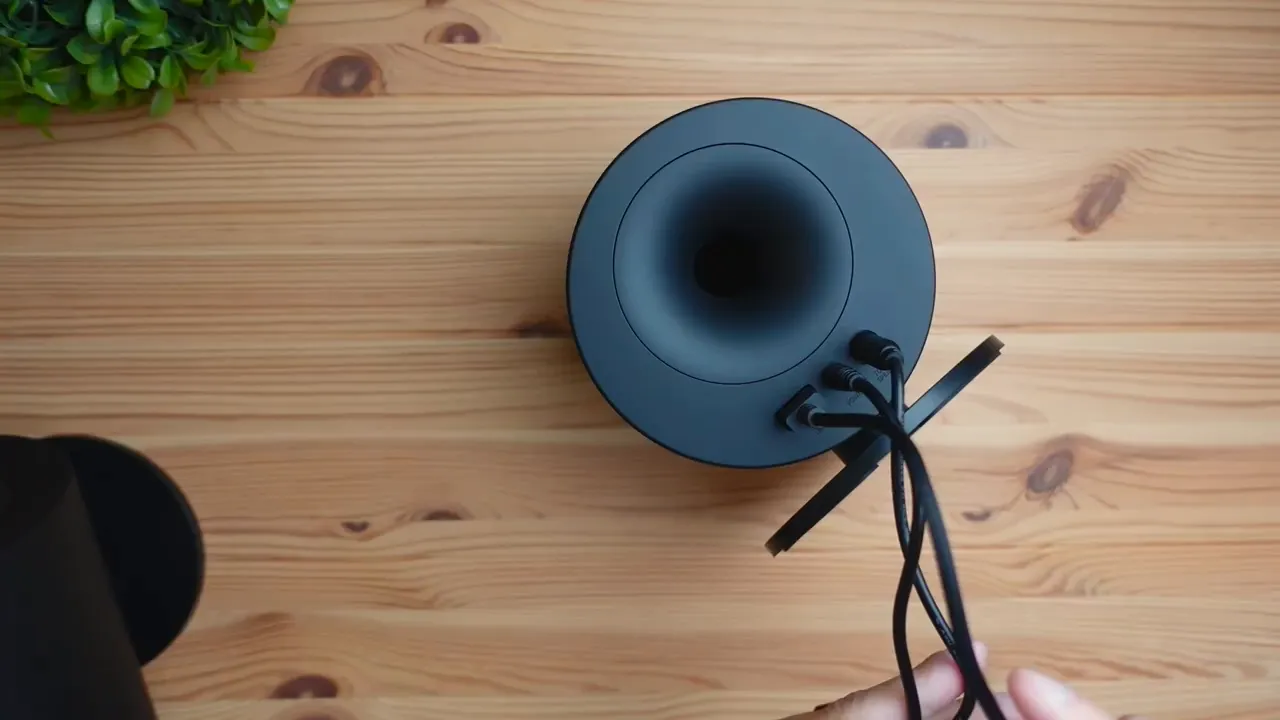 USB-A to USB-C cable connecting speaker to computer