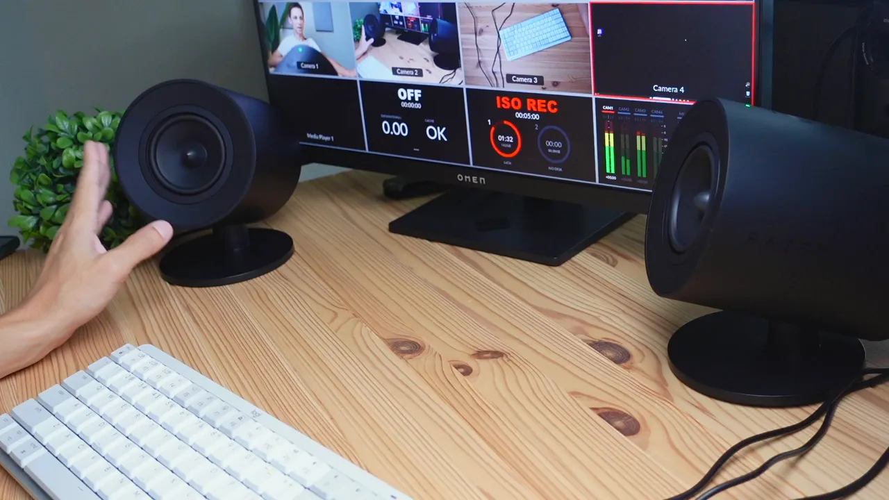 Speakers positioned beside monitor showing aesthetics on desk