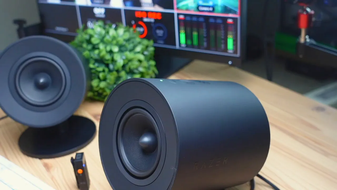 Finger touching speaker to feel bass vibration