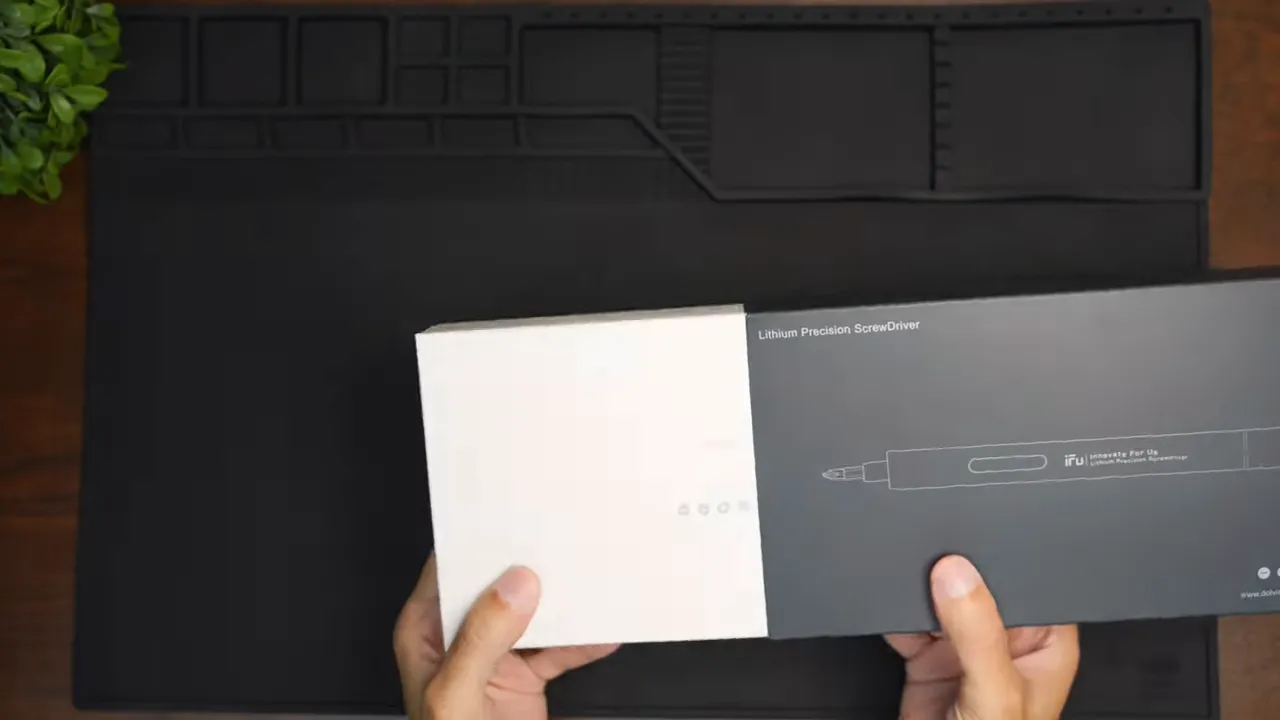 Clear top-down shot of the iFu Mini Electric Screwdriver boxed package with illustration and text