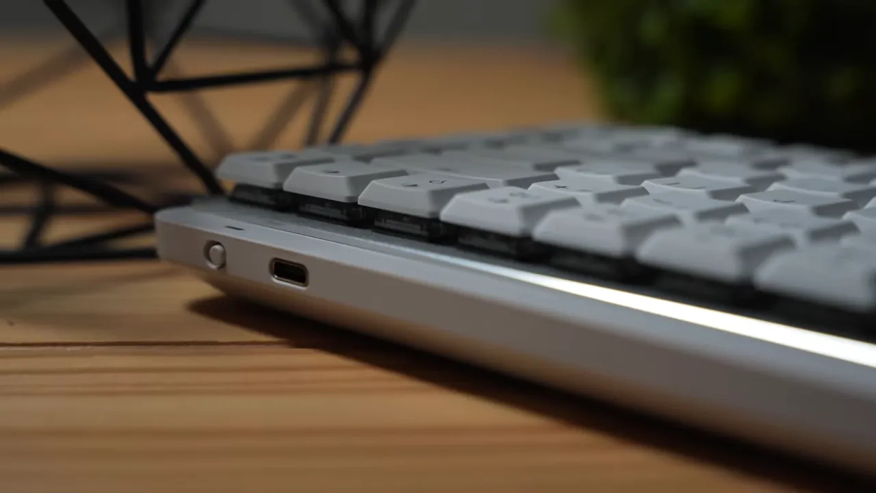 Logitech MX Mechanical Mini side profile showing aluminum top plate low profile keycaps and USB-C port