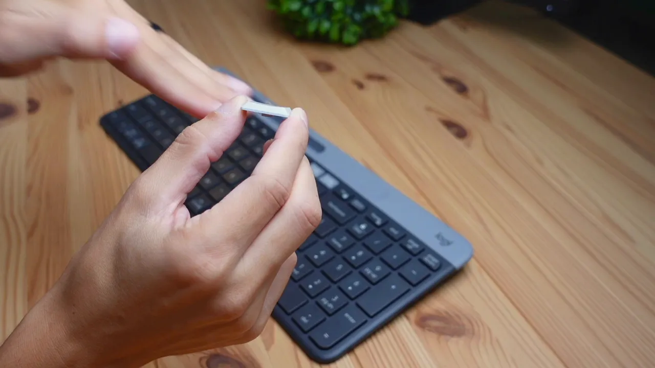 close-up comparing flat keycaps to concave keycaps from a mechanical keyboard