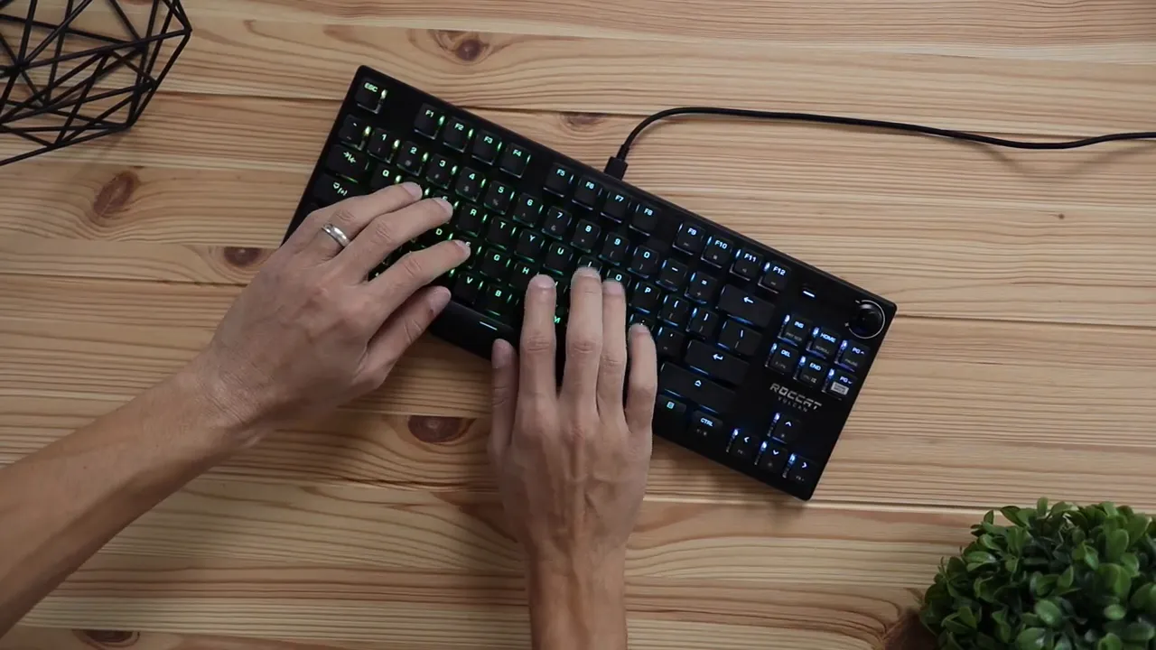 Top down view of hands typing on the keyboard