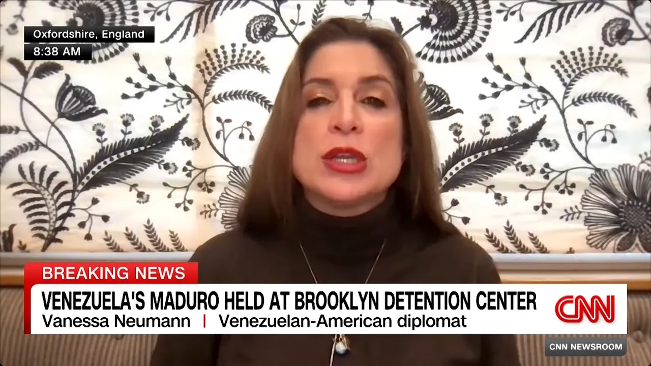 Clear television interview frame of a commentator with a CNN breaking news chyron reporting Maduro's detention, suitable for illustrating international reaction.