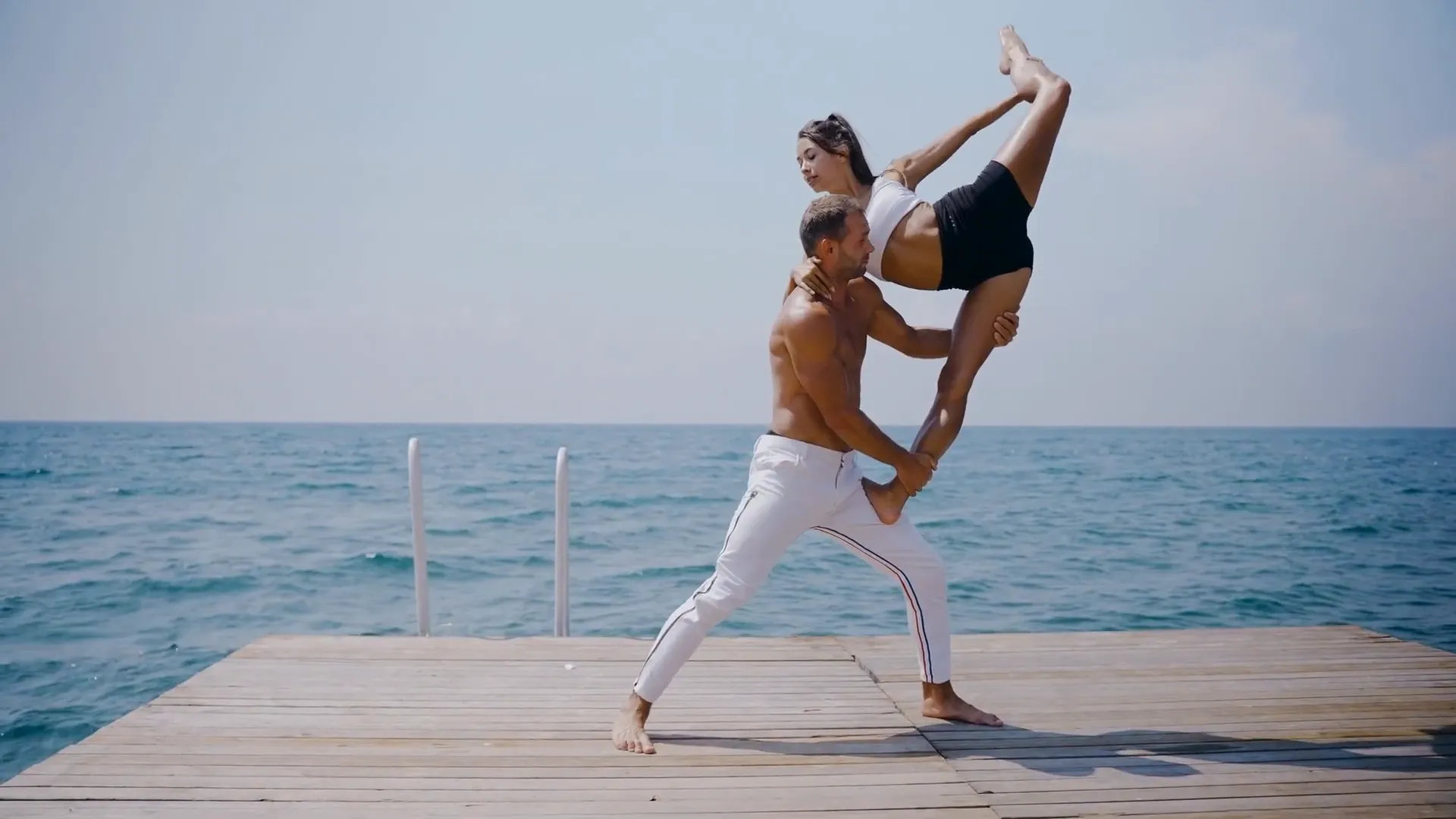 Man doing yoga to improve flexibility