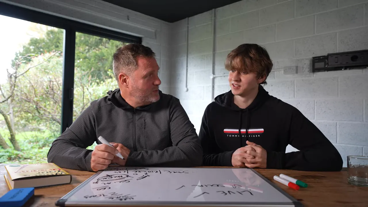 Two founders seated at a table mapping strategy on a whiteboard with markers and a book visible — a clear wide shot suitable for illustrating retail and lead capture tactics.