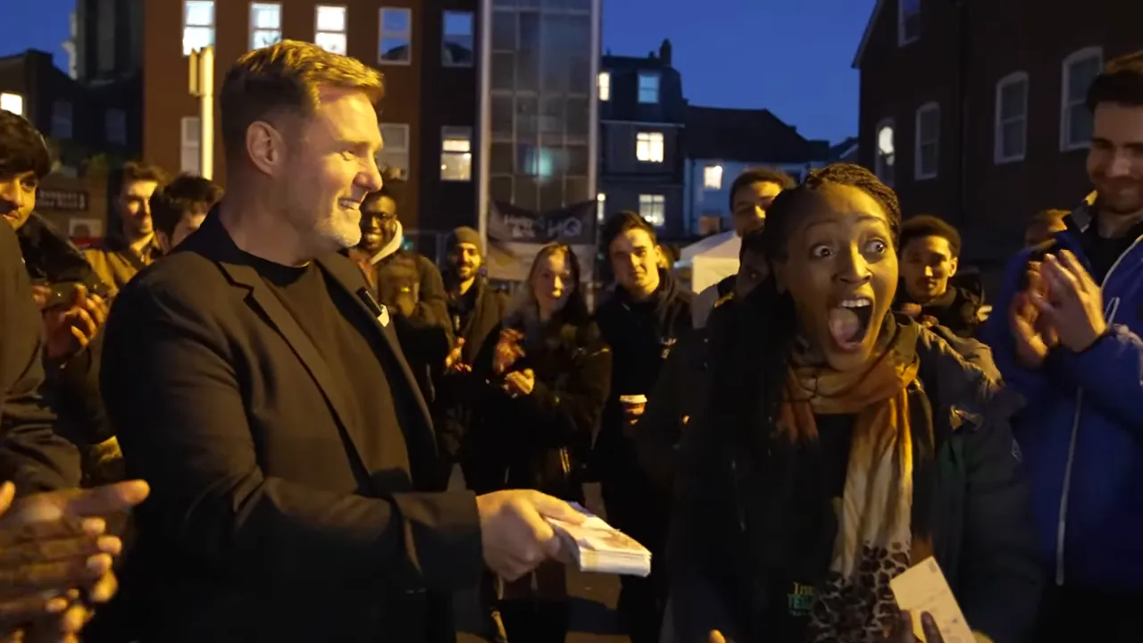 The moment of the £5,000 deal handshake and community backing