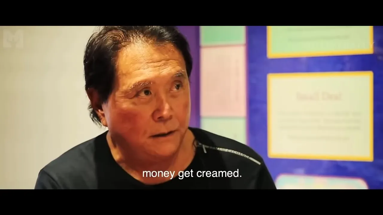 Close-up of a speaker in interview with subtitle 'money get creamed' visible