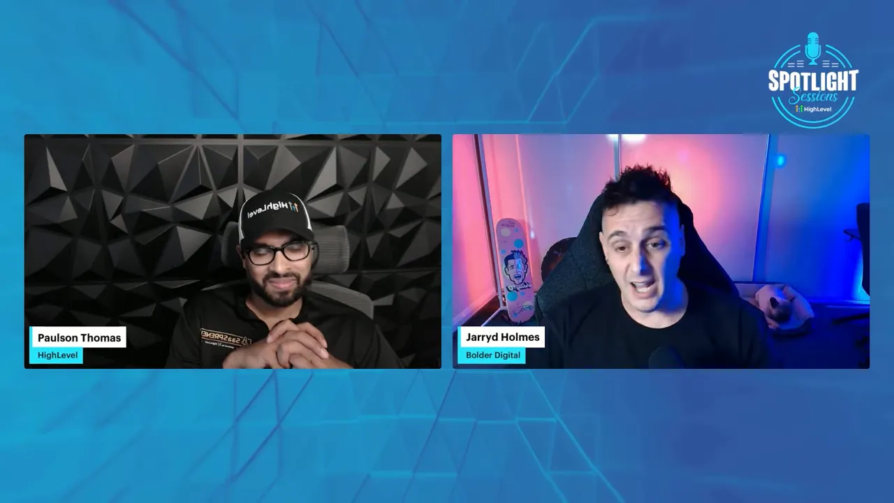 High-quality split-screen interview: left participant smiling in a studio, right participant mid-sentence with pink and blue ambient lighting; branded background.