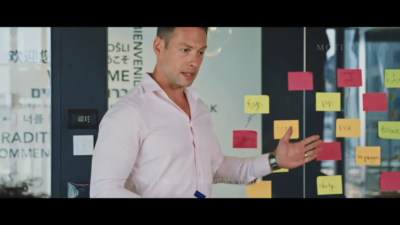 Person presenting sticky-note plan on glass wall for funnel mapping