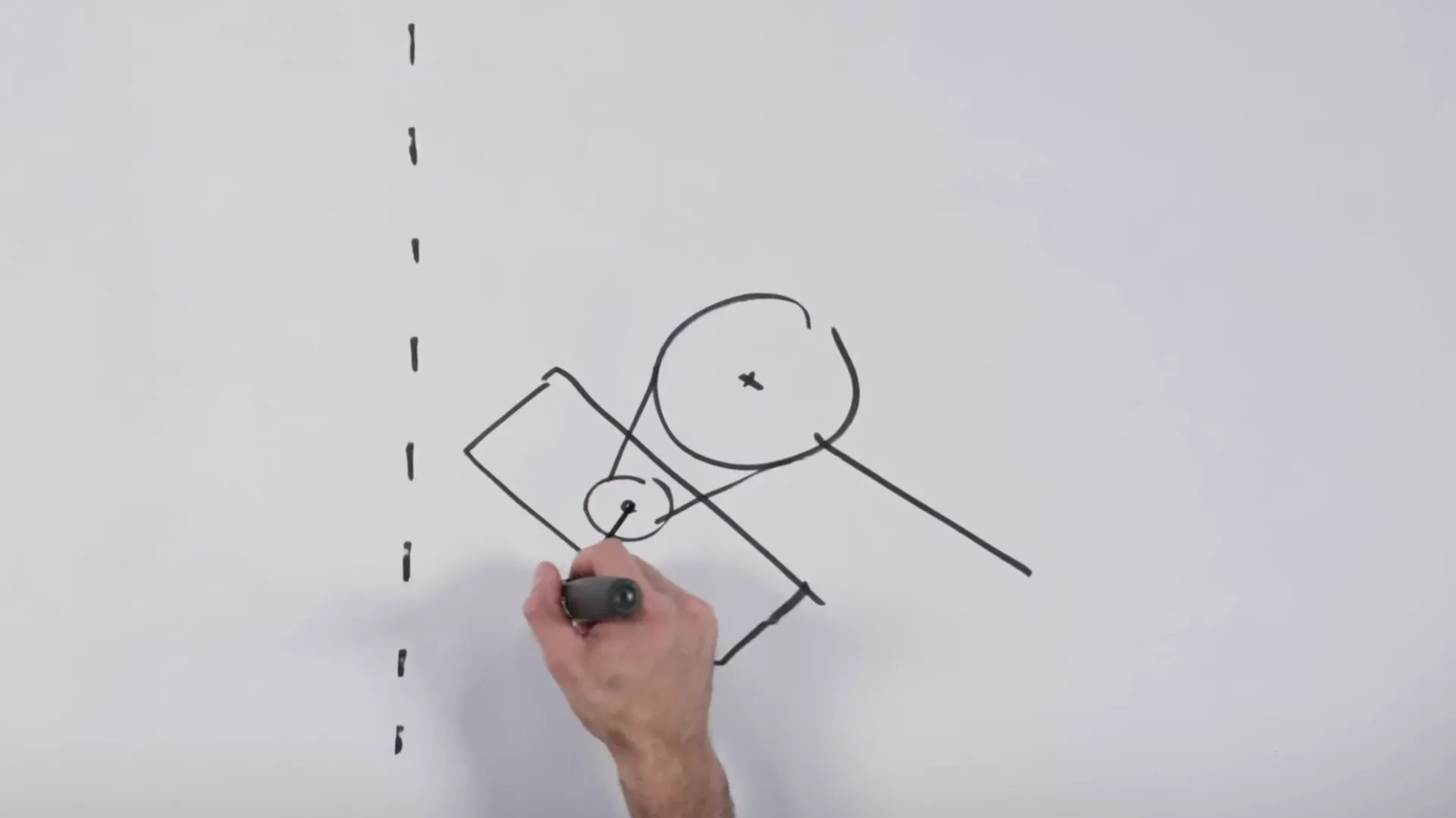 Magnifying glass focusing light to burn a hole through paper