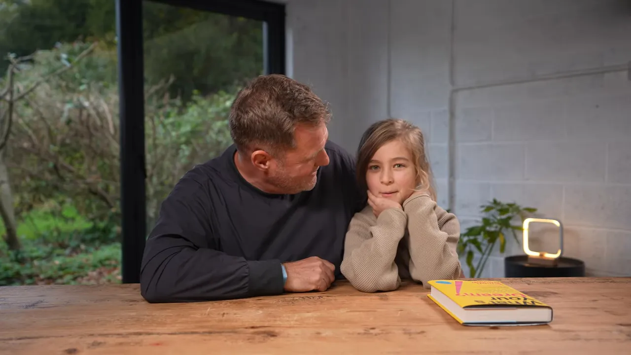 Simon with his son discussing home education and community