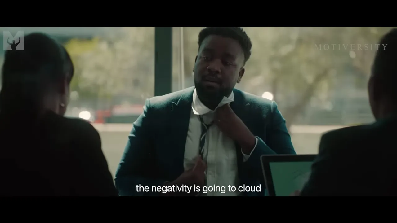 Speaker noting that negativity clouds thinking and the need to deactivate negatives