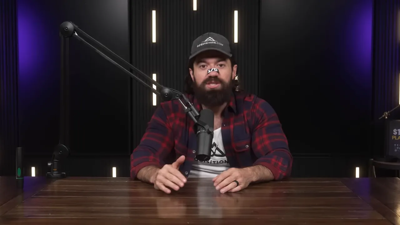 podcast host gesturing with hands at a table, microphone in front, clear studio background