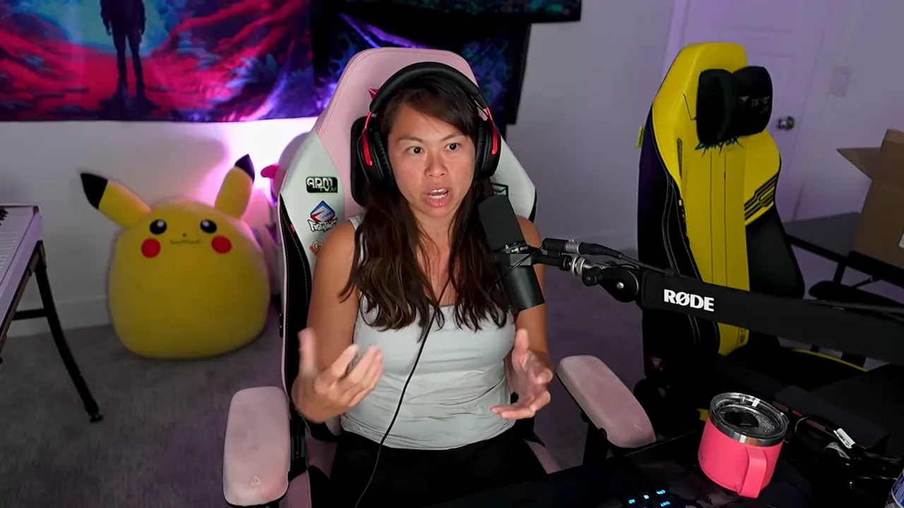 Creator recording at a desk with headset and microphone, mid-explanation, showing a clear content-creation workspace.