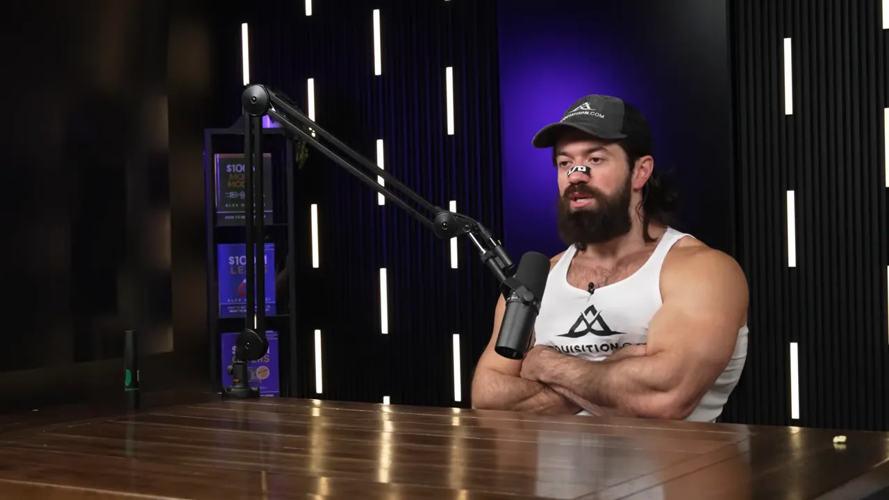 Podcast host explaining automation, seated at a wooden table with a boom microphone and purple studio lighting, mid-sentence