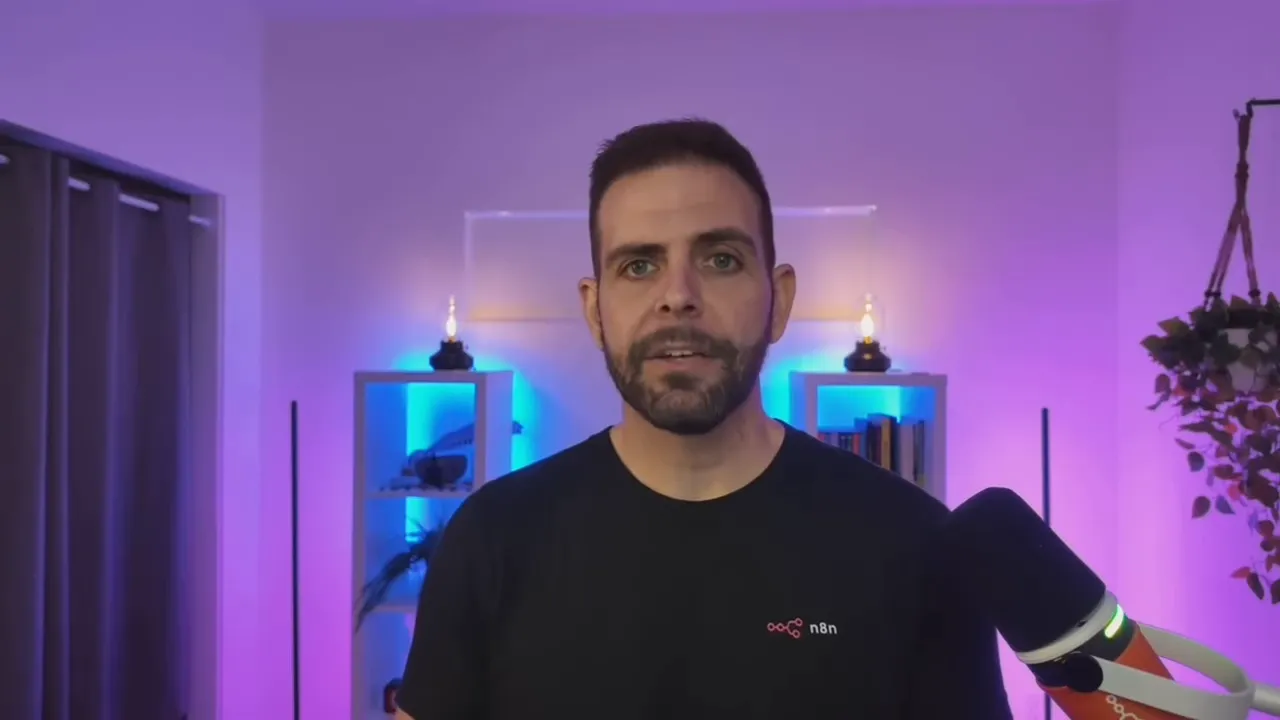 Host in purple‑lit studio wearing an n8n shirt with microphone visible, explaining workflow integration.