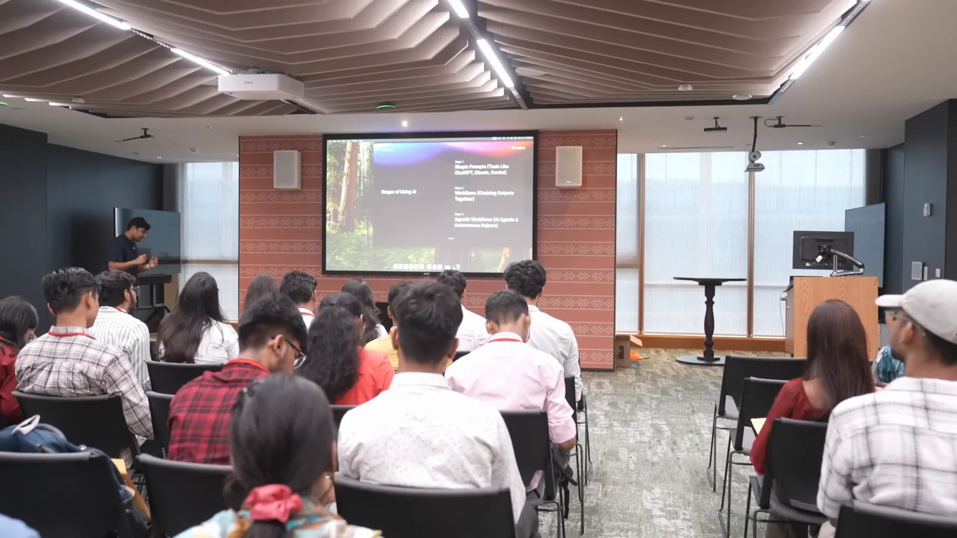 Slide explaining agentic workflows and AI agents