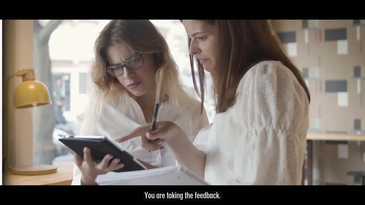 Candidate talking through ideas while sketching