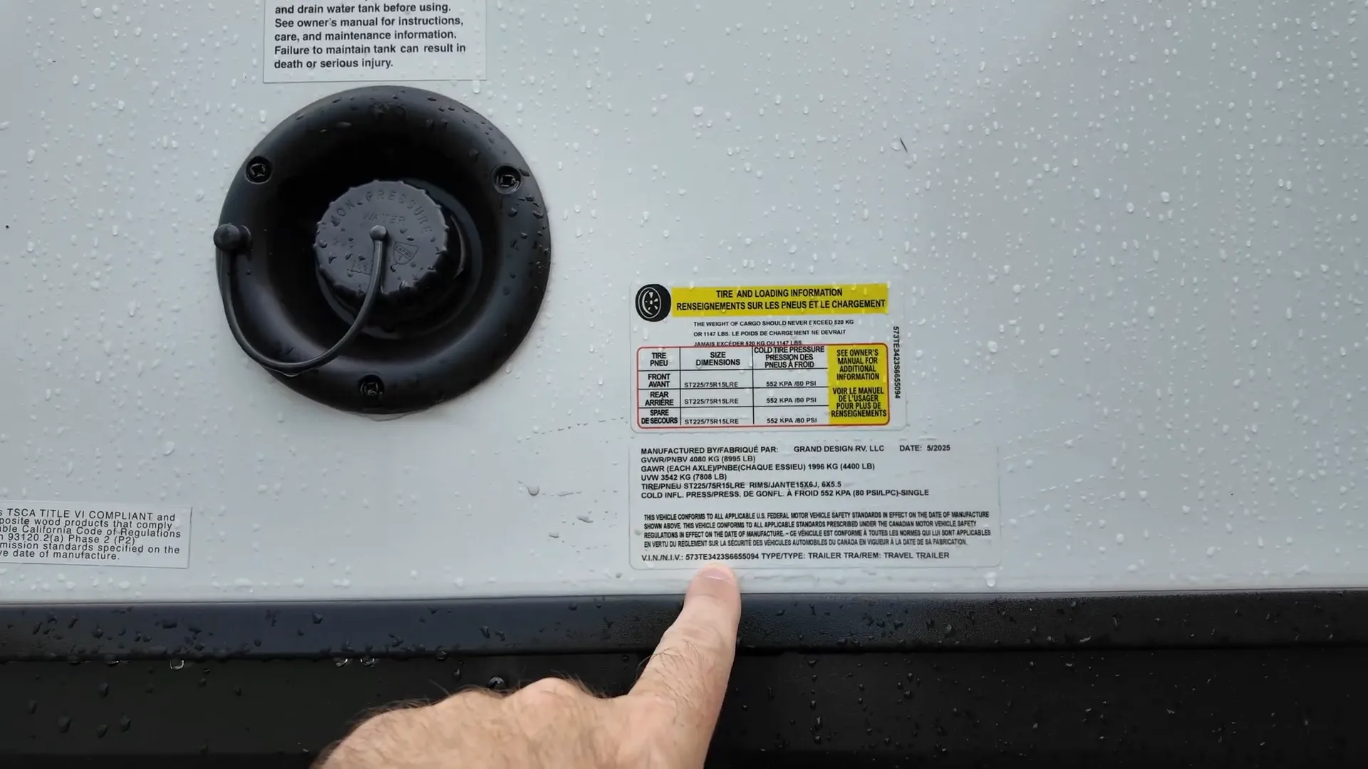 Trailer GVWR plate showing gross vehicle weight rating and unloaded weight