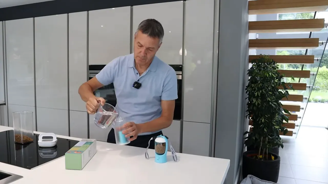 Pouring water into the bottle before heading out