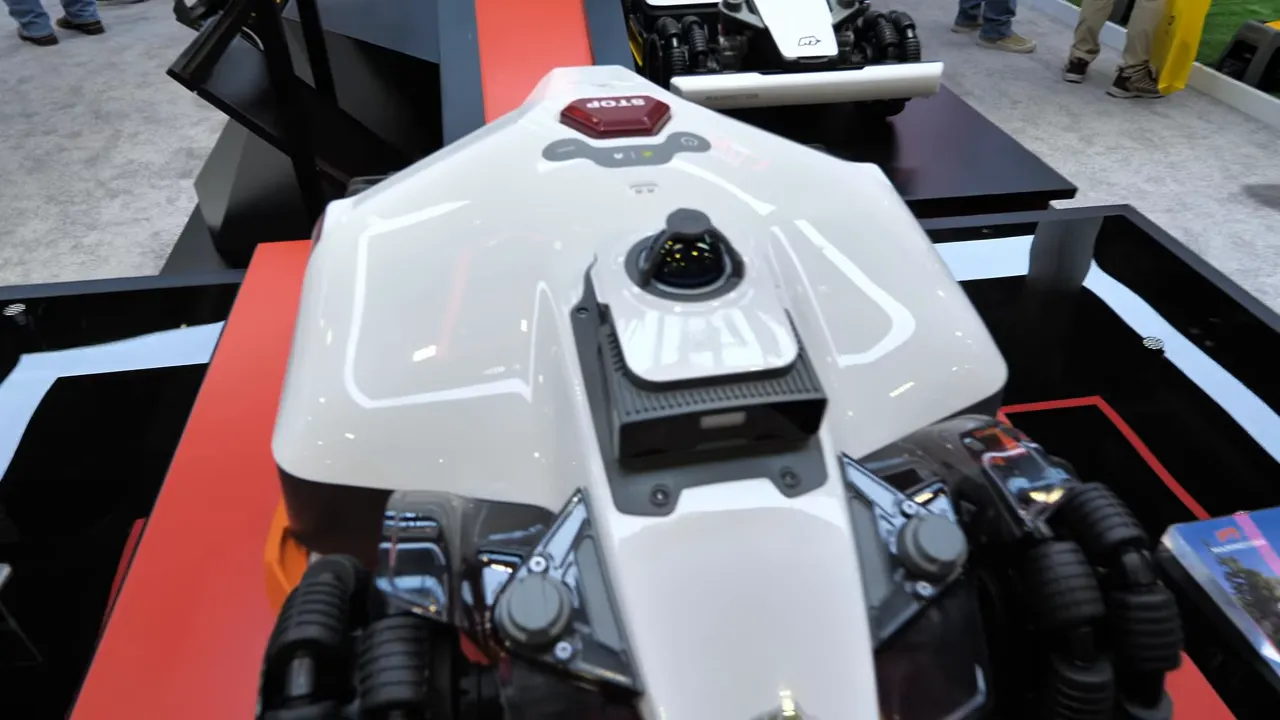 Top-down view of Mammotion Luba 3 showing central 360-degree LiDAR dome and camera unit