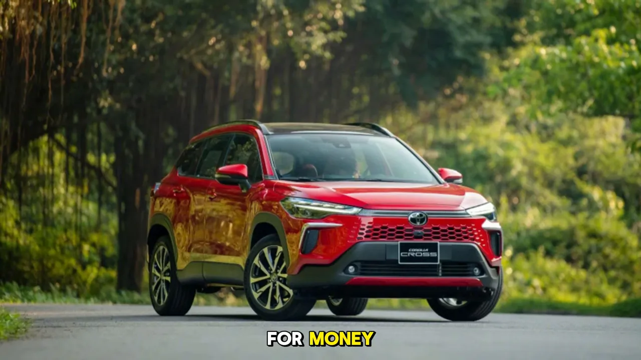 2025 Toyota Corolla Cross red front three-quarter view on a road with trees in background