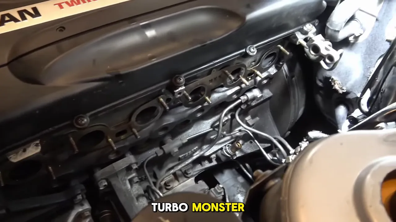 Close-up of an inline‑six engine bay showing turbocharger, exhaust manifold and intake area