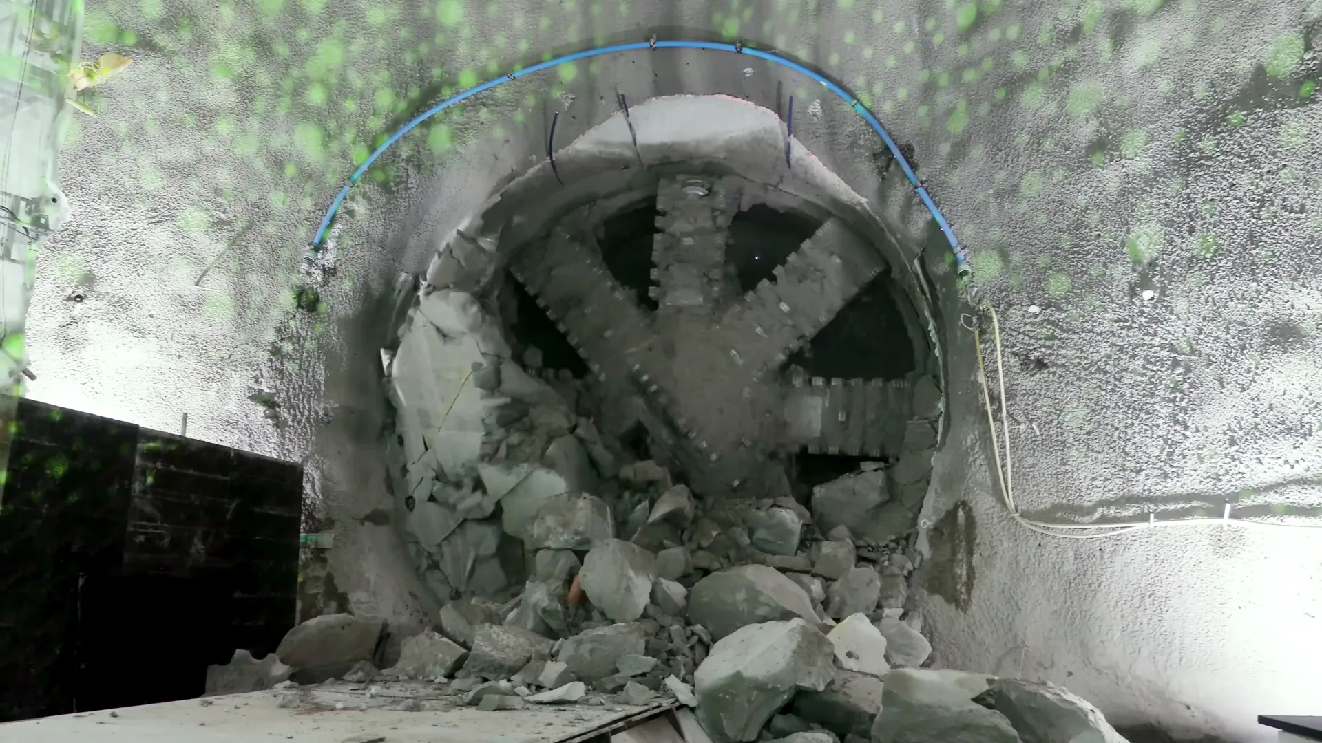Tunnel boring machine cutting through earth