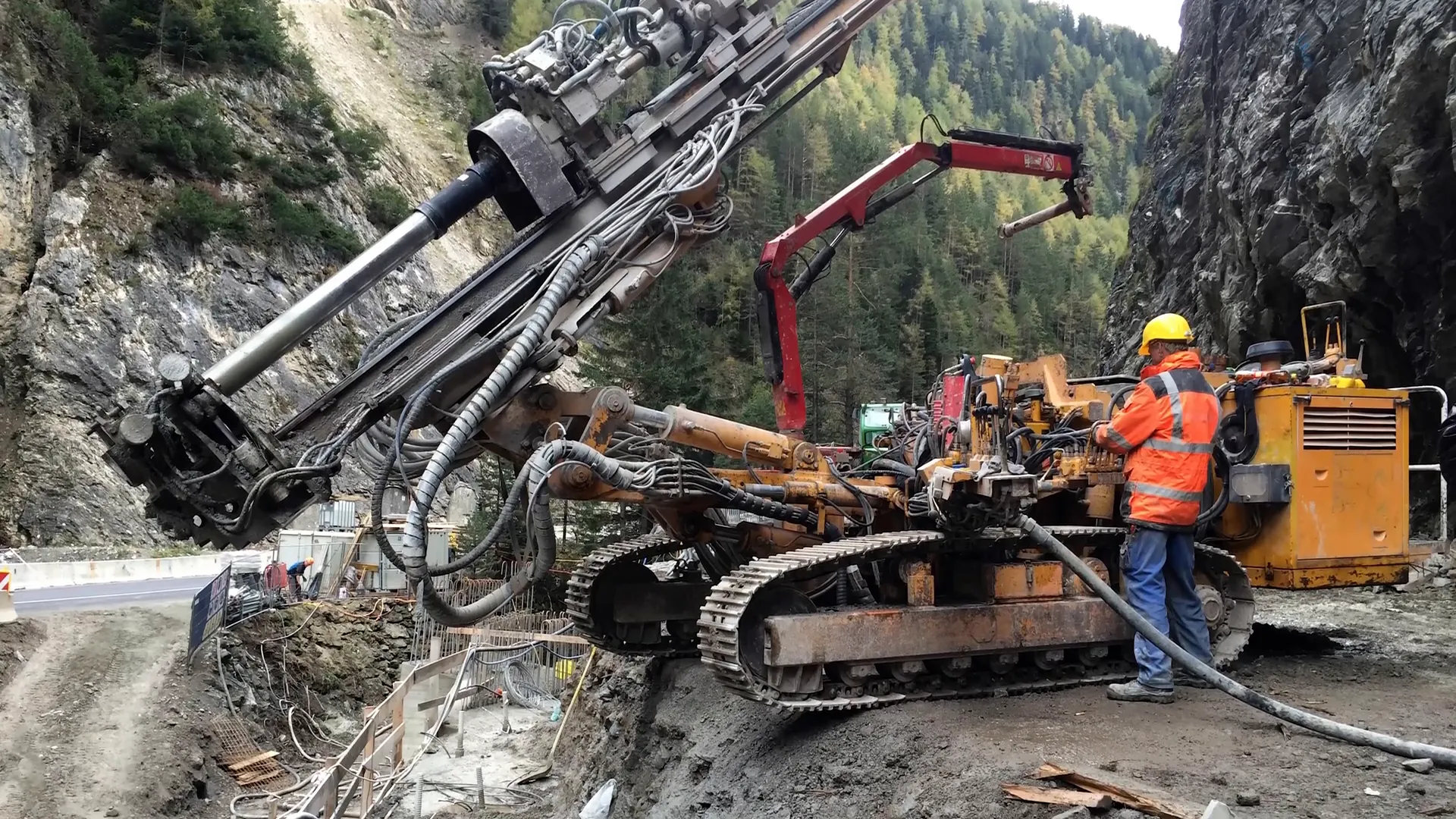 Soil nail rig drilling horizontal shafts in slope