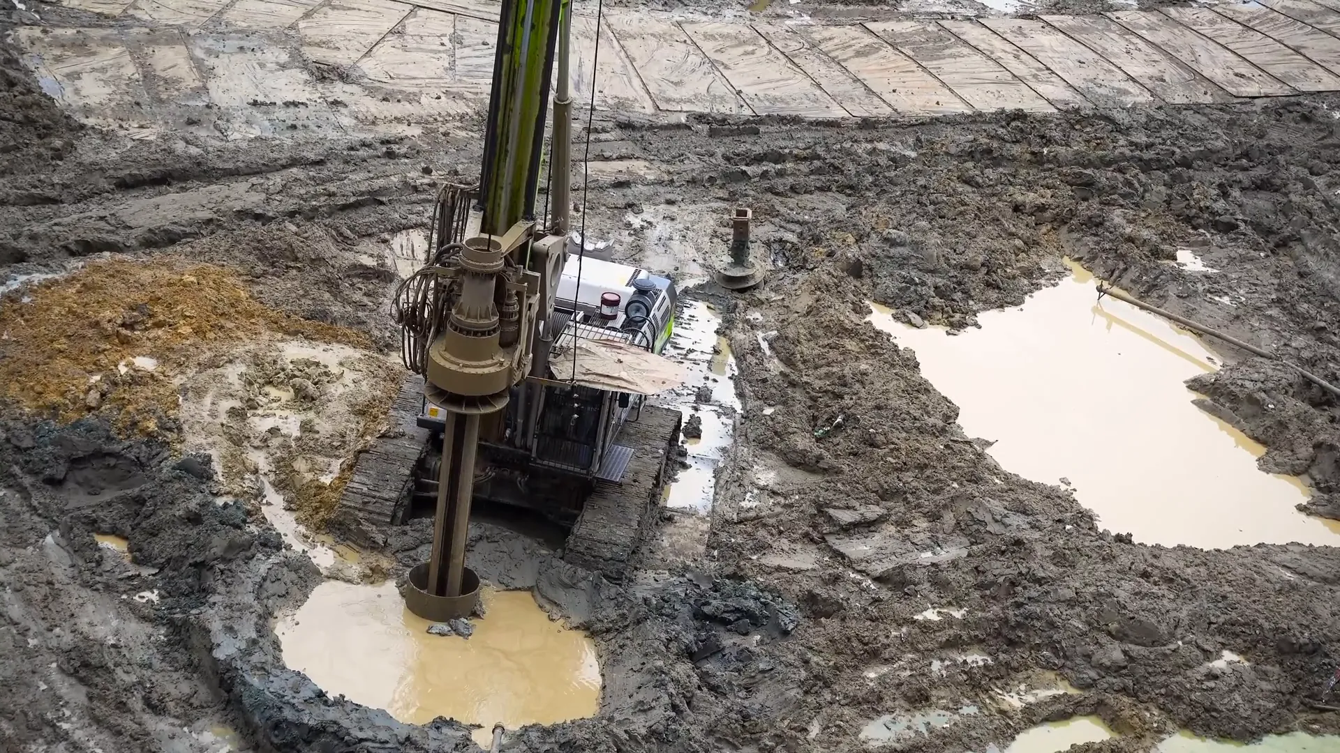 Pile drill rig drilling deep foundation hole
