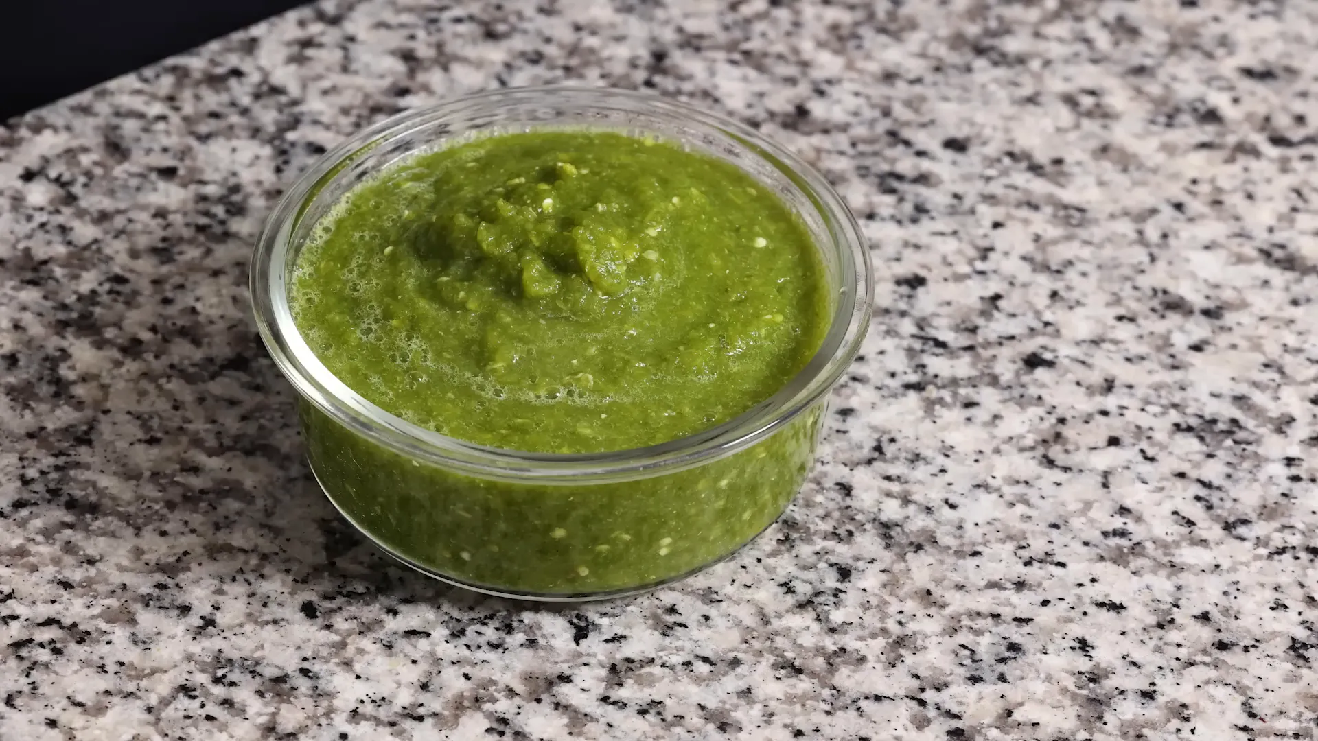 Fresh jalapenos and serranos in warm water