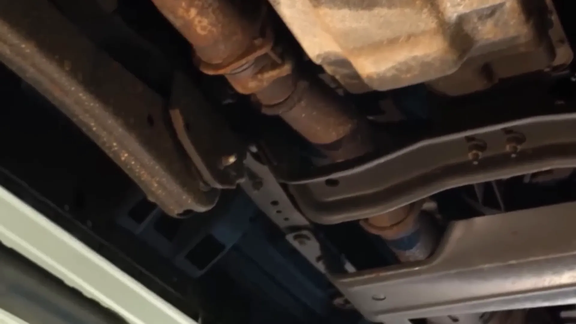Undercarriage rust and corrosion on car frame